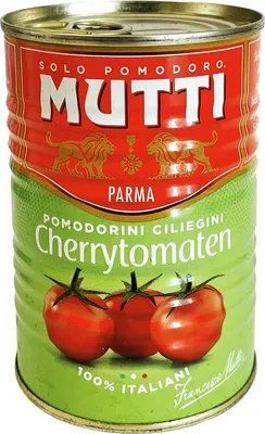 A close-up, front-facing studio shot of a can of Mutti cherry tomatoes.