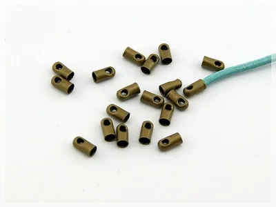 Produktbild von Vintageparts 30 Endkappen antik Bronze, 1,8 mm Innendurchmesser