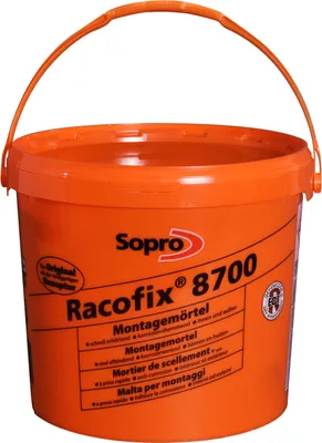 An orange bucket of mortar with a handle, shown against a white background.