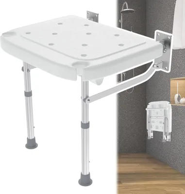 A white foldable shower seat mounted on a wall in a shower stall.
