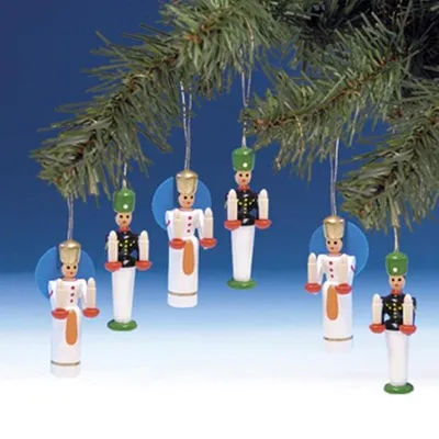Christmas tree ornaments hanging from a branch.