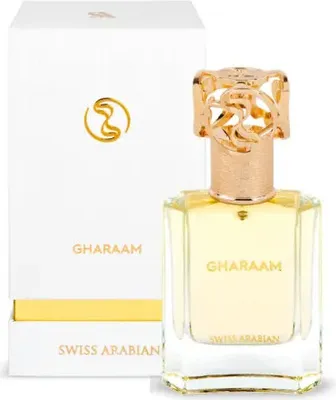 A bottle of Swiss Arabian Gharaam perfume and its packaging are displayed against a white background.