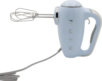 A light blue Smeg hand mixer with silver beaters and accents, shown against a white background.