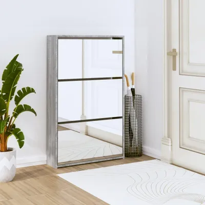 Image de Armoire à chaussures avec miroir, 3 portes rabattables, finition gris Sonoma, dimensions 63 x 17 x 102,5 cm