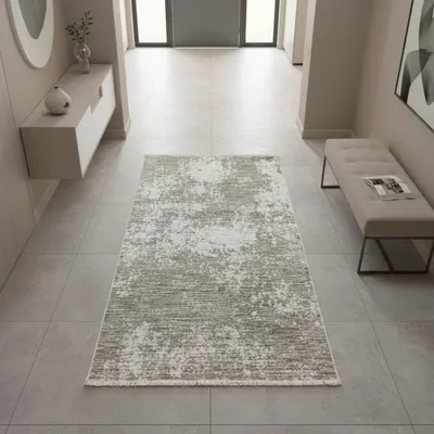 Image de Tapis moderne beige crème avec motif abstrait et franges. Dimensions : 80 x 150 cm
