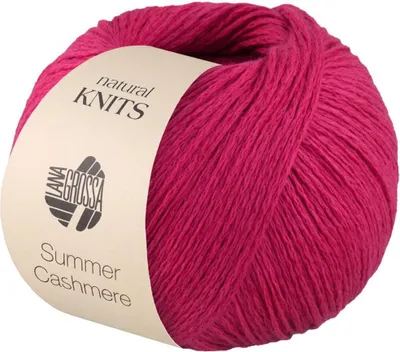 A ball of pink yarn with a label.