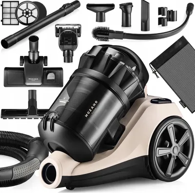 A collection of vacuum cleaner parts and accessories arranged around the main vacuum cleaner unit.