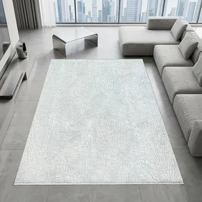 Immagine prodotto di Tappeto color crema con motivo astratto a linee, frange e design moderno. Dimensioni: 120 x 160 cm
