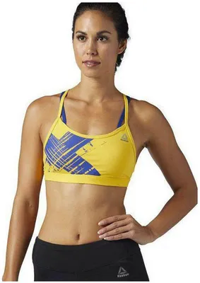 Imagen del producto de Sujetador deportivo Reebok STRAPPY, color amarillo, talla XS