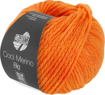 A ball of orange yarn with a label.