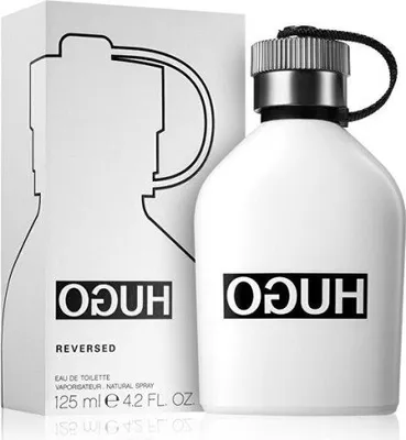 A white bottle of Hugo Boss Reversed Eau de Toilette for men and its packaging are shown against a white background.