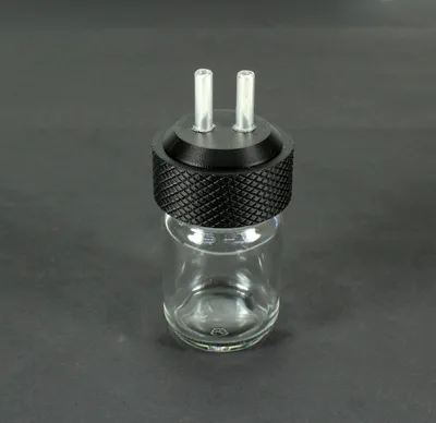 Produktbild von Aroma Flasche 50ml für z.B. Gasmasken S10 FM12 GP5 Gasmask Adapter mit 2x6mm Alu Rohr
