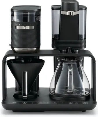A black coffee machine with a grinder and carafe is shown against a white background.