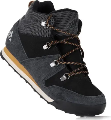 A single Adidas Terrex Climawarm Snowpitch boot is shown against a white background.