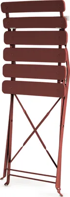 A red metal folding chair, viewed from the back.