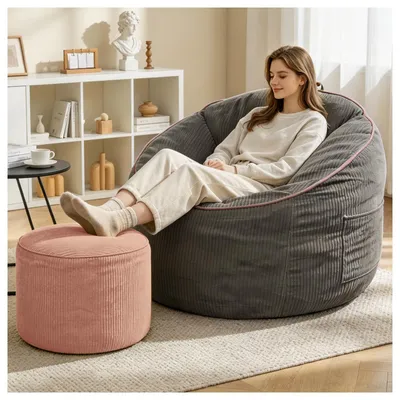 Produktbild von STILVORA Sitzsack-Sessel ergonomisch mit gebogener Form und Ablagetasche, Loungesessel mit zylindrischem Hocker, Wohnzimmersessel für Wohnkomfort