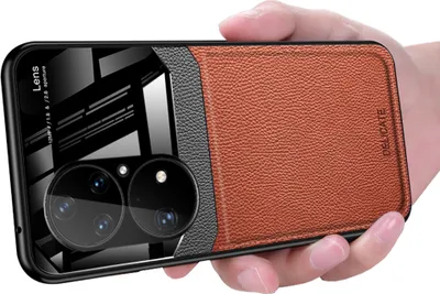 A hand holding a smartphone case.