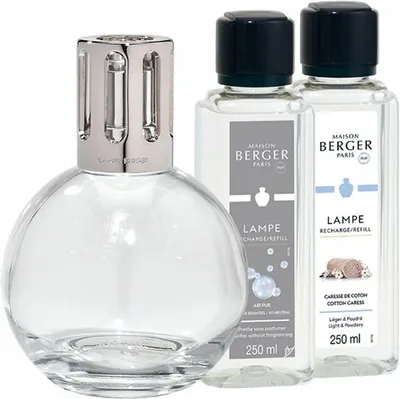A Lampe Berger set including a clear glass diffuser and two refill bottles.