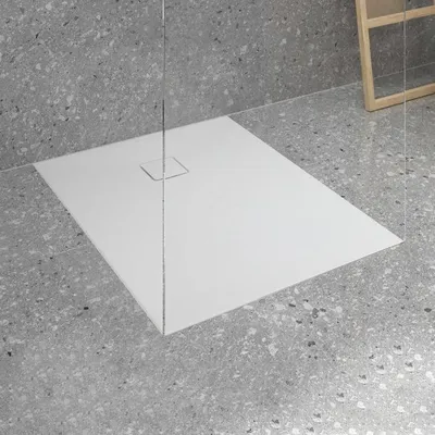 Immagine prodotto di Doccia Lastani di Ideal Standard, dimensioni 100 x 80 cm, realizzata in acrilico sanitario con nucleo in resina minerale (StoneTech™), superficie antiscivolo, installazione a filo pavimento