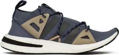 A side view of a single athletic shoe.