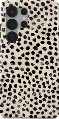 A phone case with a dalmatian-like print.