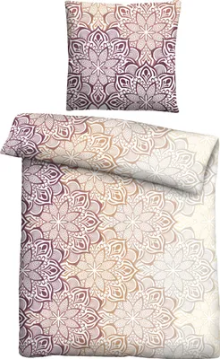A pillow and a duvet cover with a mandala pattern.