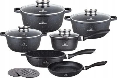 A set of cookware with speckled black coating and glass lids, arranged on a white background.