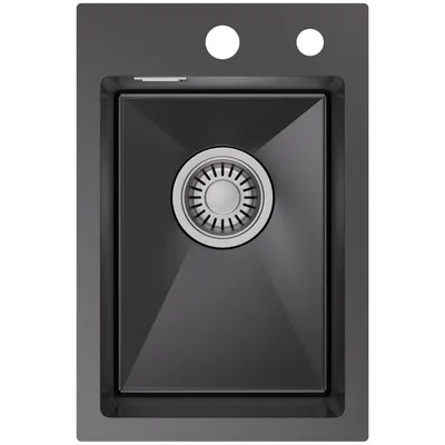 A top-down view of a black kitchen sink with a silver drain.