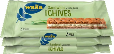 A stack of three Wasa Sandwich Cheese & Chives cracker packs.