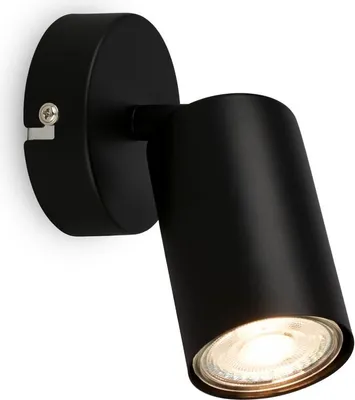 A black wall lamp with a spotlight head, mounted on a white background.