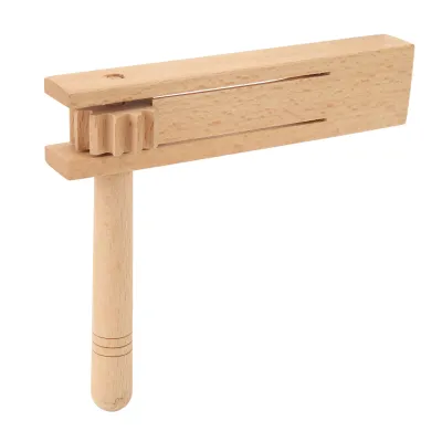 A wooden ratchet noisemaker on a white background.