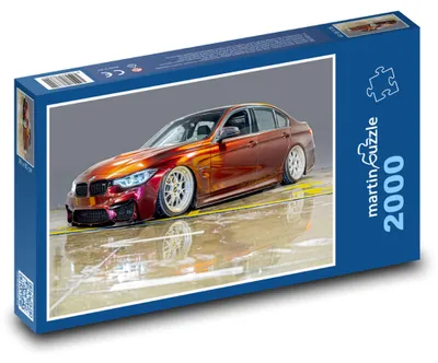 Obrázok produktu pre Puzzle 2000 Športové auto v uliciach - martinpuzzle