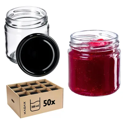 A collection of glass jars, some filled with red jam, and a cardboard box containing multiple jars.