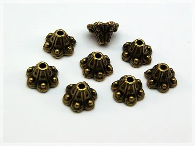 Produktbild von Vintageparts Perlkappen antik Bronze 9 mm, 20 Stück