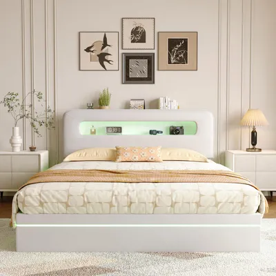 A modern white bed with LED lighting and storage in a bedroom setting.