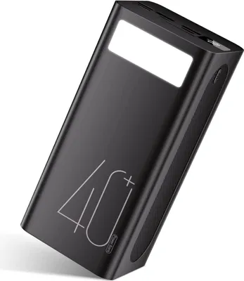 A black power bank is shown at an angle against a white background.