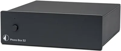A black phono preamplifier is shown from a front-diagonal angle against a white background.