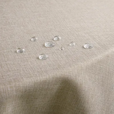Immagine prodotto di Tovaglia rotonda, diametro 120 cm, lavabile, aspetto simile al lino, color beige, idrorepellente, realizzata in poliestere