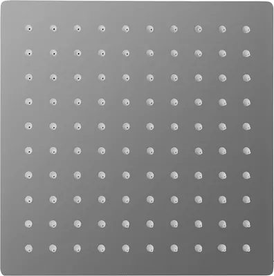 A close-up, top-down view of a square shower head with multiple small nozzles.