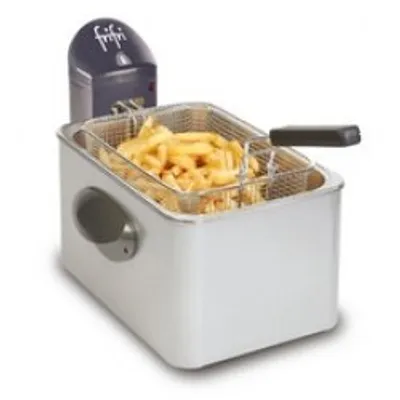 A deep fryer filled with french fries.
