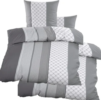 A neatly folded set of bedding, including pillowcases and a duvet cover, displayed against a white background.