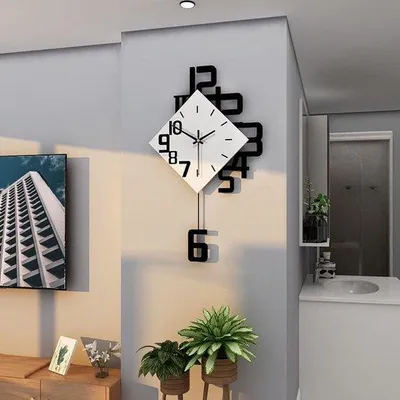 Image de Horloge murale Unyqoos® 63x34 cm – design minimaliste, silencieuse (sans tic-tac), fonctionnant sur piles, cadran en MDF, aiguilles en aluminium, noir et blanc, avec pendule