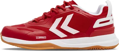 A side view of a red and white athletic shoe.