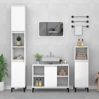 A bathroom vanity and storage units are displayed in a modern bathroom setting.
