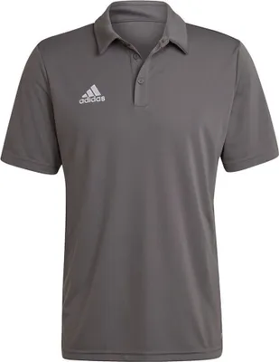 A plain studio shot of a grey Adidas polo shirt.