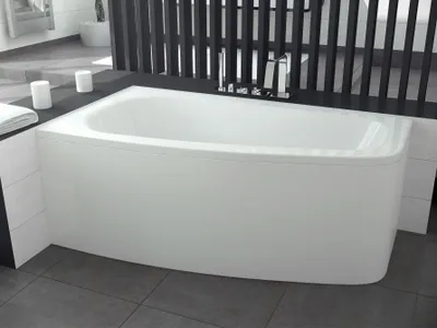 A white corner bathtub in a modern bathroom setting.