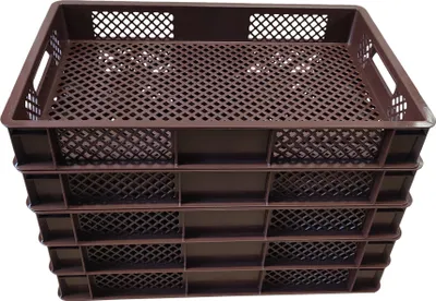 A stack of five brown plastic crates.