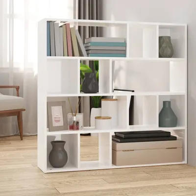 A white bookshelf filled with decorative items and books, placed in a room with natural light.