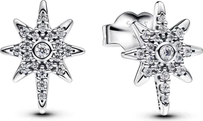 A pair of star-shaped stud earrings with clear stones.