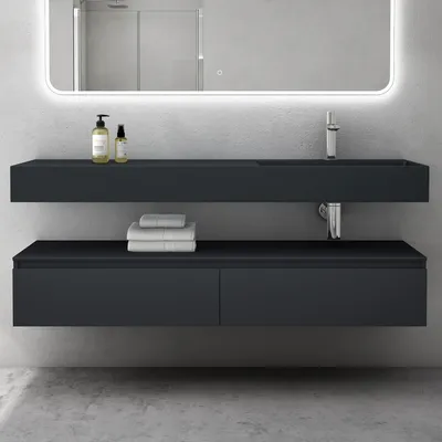 A modern bathroom vanity set with a wall-mounted sink and cabinet, featuring minimalist design and clean lines.